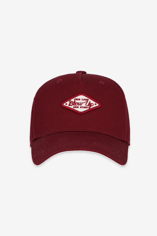 OUR STORY RED WINE CAP BLOW UP